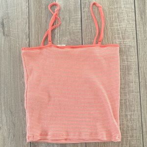 This is a coral and white striped camisole in size small from levi’s